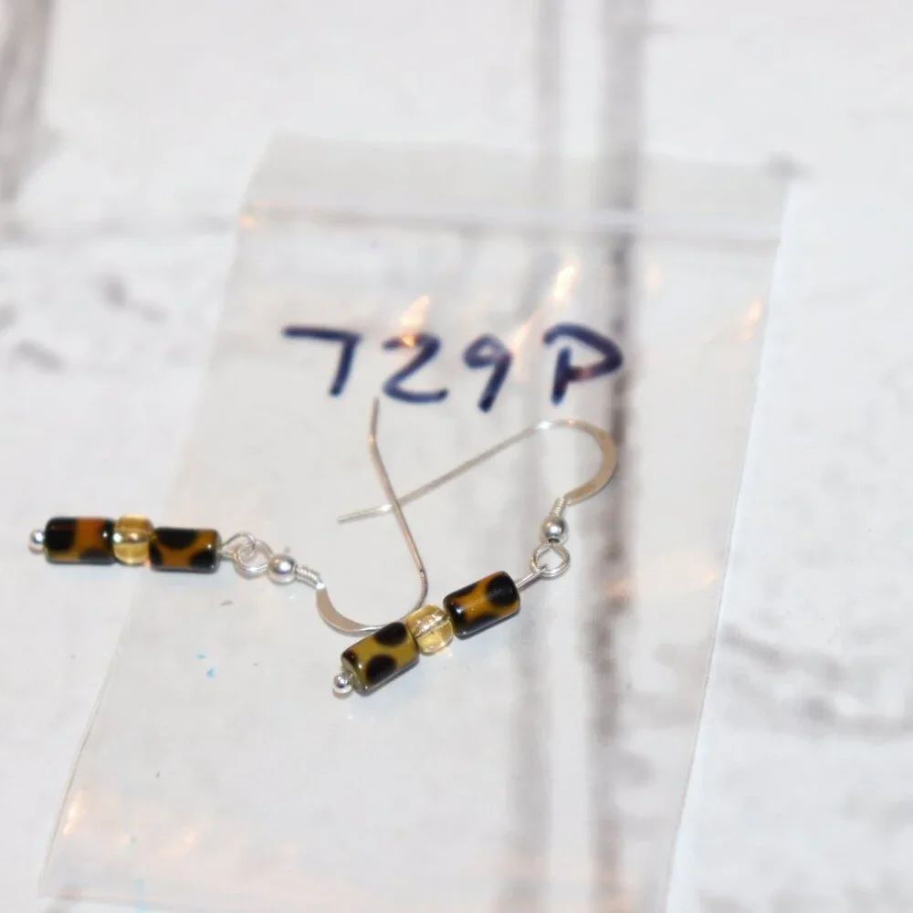Beautiful NWOT Silver, animal print and yellow dangle earrings 1.5
